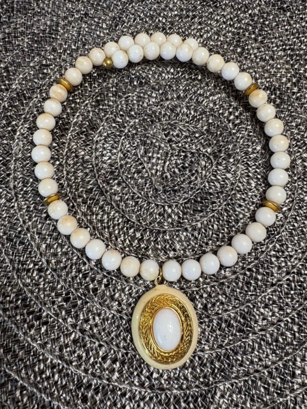 White Beaded Necklace with Gold Oval Pendant
